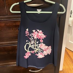 Navy sleeveless blouse with beautiful flower detail. New condition. Size S